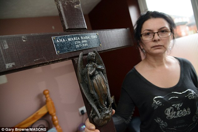 The mother-of-two also discovered her 10-year-old daughter's grave buried upside down in her garden