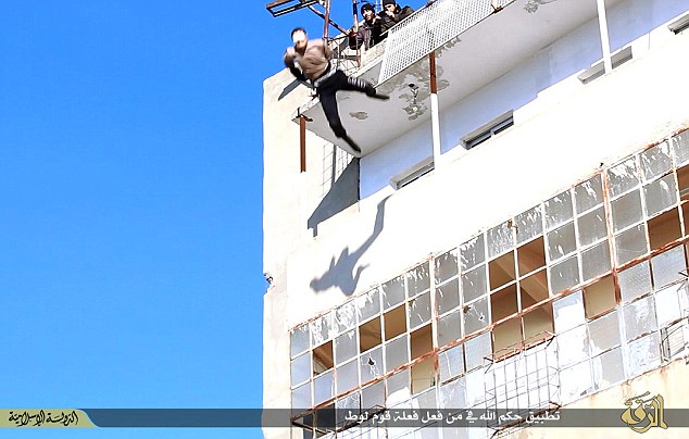 Horror: The blindfolded man is dragged to the roof of the tallest building in the neighbourhood by bearded militants, who use mobile phones to film him being barbarically thrown to his death