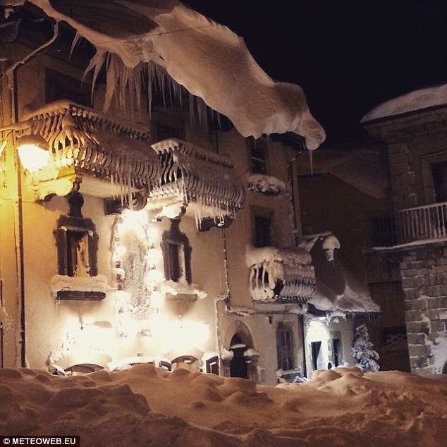 Snow remained clinging to the balconies and ledges of buildings following the 18 hour-long blizzard